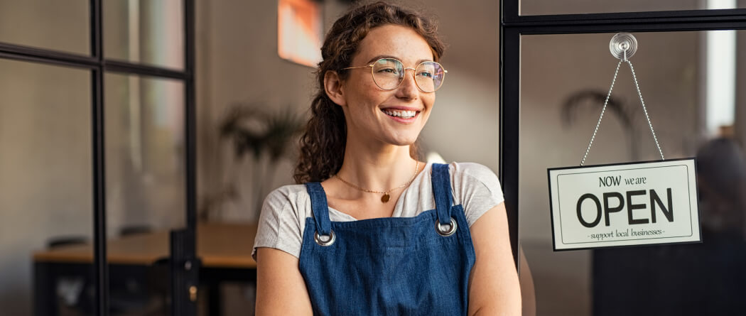 a small business owner smiling